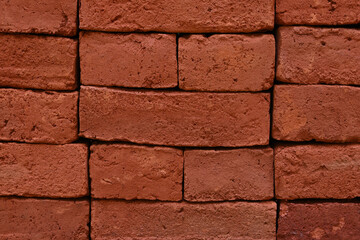 Close up surface view of the fresh bricks stacked in a construction site