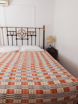 A bed with metal frame