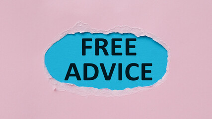 FREE ADVICE text on blue paper peeking out from a torn pink backgroun