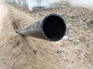 Water pipes for drinking water supply in rural areas of india. Preparation for earthworks for...