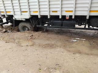 truck wheel stuck in mud