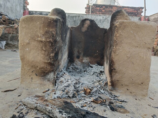 Rural kitchen. Traditional stoves used by residents in rural India, pakistan, Bangladesh, nepal, afganistan, Sri Lanka and undeveloped countries. made of clay, fueled with wood