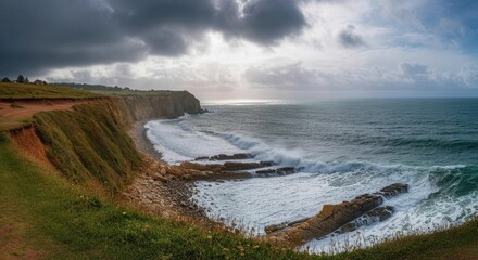 Coastal serenity at sunset with dramatic sky cliffs