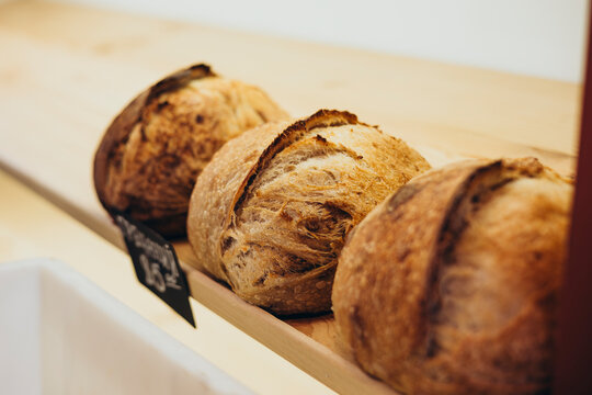 Freshly Baked Artisan Breads on Rustic Wooden Display