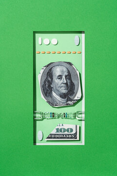 Collage style US dollar banknote made with pills and money cuts.