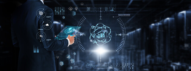 Data Science: Businessman control and monitoring data science technology system on digital screen. analytics, machine learning, data visualization, predictive modeling, big data, automation.