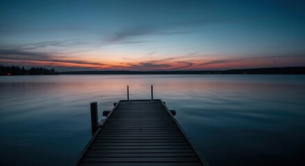 Serene lake sunset with wooden pier