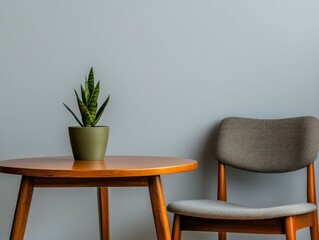 Cozy corner featuring a chair and a plant on a wooden table
