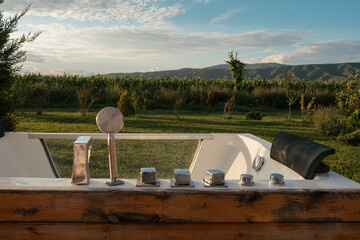 Relaxing outdoor bath with mountain view and green landscape