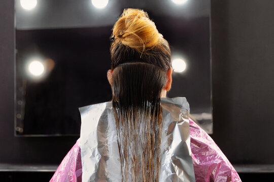 Hair coloring process in a professional salon setting