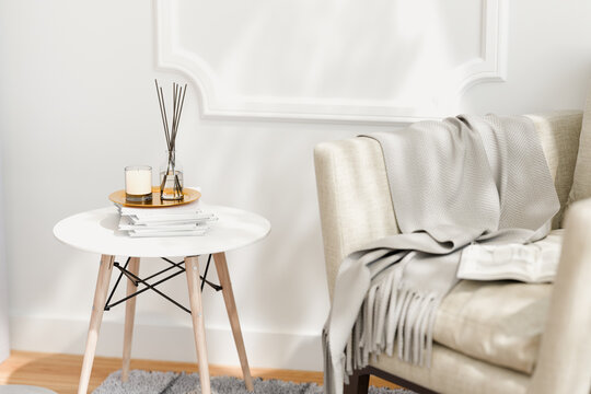 Cozy living room with fragrance scent diffuser and candle.