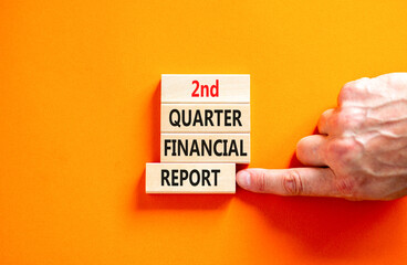 2nd quarter financial report symbol. Concept words 2nd quarter financial report on beautiful wooden blocks. Beautiful orange background. Business 2nd quarter financial report concept. Copy space.
