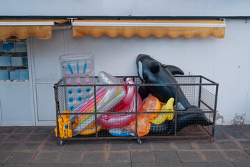 Inflatable Pool Toys in Storage Cart