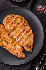 Grilled chicken fillet with salt, spices and herbs