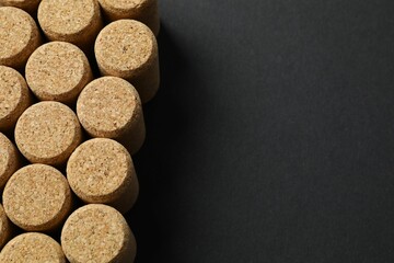 Wine corks on black background 