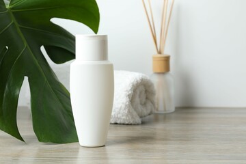 Cosmetic bottle on the table. Personal hygiene products 