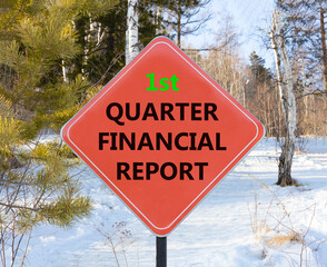 1st quarter financial report symbol. Concept words 1st quarter financial report on beautiful red road sign. Beautiful forest background. Business 1st quarter financial report concept. Copy space.