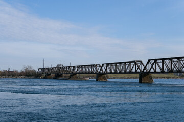 Railroad bridge between Canada and USA Fort Erie late fall over Niagara River