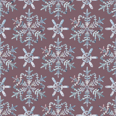 Seamless winter pattern. Granulation watercolour snowflakes on a pink background. Frost crystals drawings. Hand drawn illustration. For fabric, sketchbook, wallpaper, wrapping paper, invitation decor
