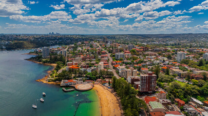 Naklejka premium beautiful Aerial View of Manly Beach and Sydney harbour with manly houses on a warm summer day blue skies Sydney NSW Australia