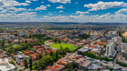 beautiful Aerial View of Manly Beach and Sydney harbour with manly houses on a warm summer day blue skies Sydney NSW Australia