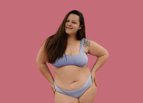 Cheerful young woman in lingerie 
