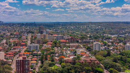 Naklejka premium Aerial View of Manly Beach and Sydney harbour with manly houses on a warm summer day blue skies Sydney NSW Australia
