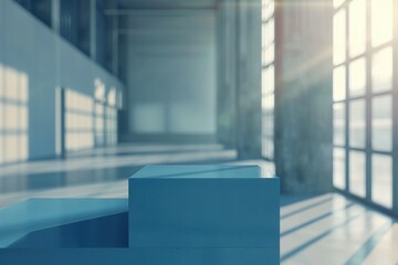 A blue bench in a large room with windows, suitable for office or home use