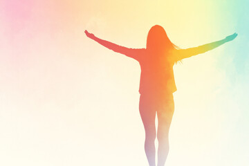 Obraz premium A woman is standing with her arms outstretched, and the background is a colorful