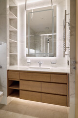 Explore modern bathroom designs with elegant features, stylish lighting, and functionality