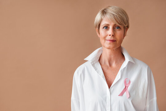 Empowered Woman in Pink Ribbon