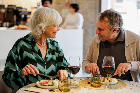Senior couple enjoying lunch together at the restaurant