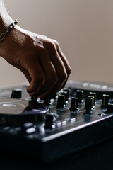 DJ in Dark Night Club with Vibrant Lighting