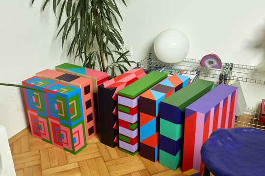 Colorful works of art on the floor