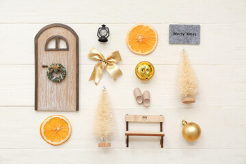 Many Christmas symbols on white wooden background