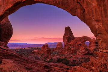 A sunrise  view of turret arch through the north window in arches © mike
