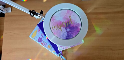  illuminating journals with desk lamp