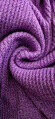 spiraled knitted purple wool fabric