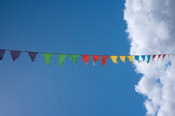 Colorful Bunting Against Blue Sky