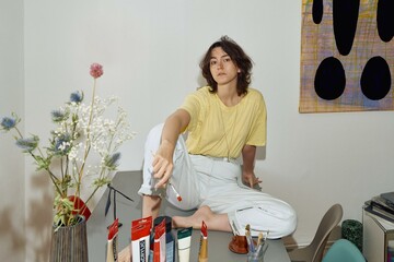 Artistic reflection in a vibrant studio