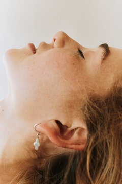Closeup portrait of woman with closed eyes