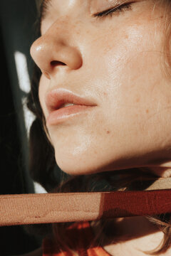 Closeup portrait of woman with glow skin