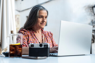 Social media content creator editing photos