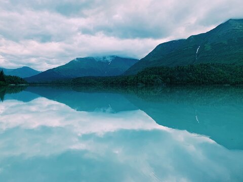 reflection of lake and mountains
