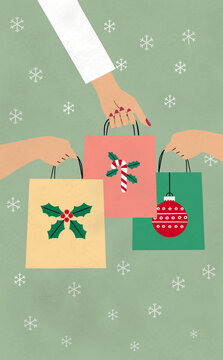 Three individuals carrying bags of holiday items. 