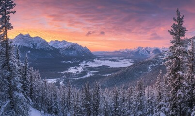 A picturesque winter sunrise over a snow-blanketed mountain valley