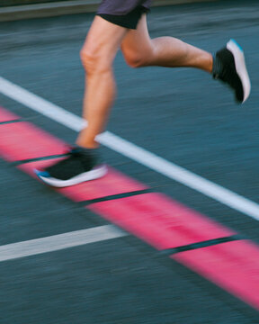 A runner crosses the finish line 