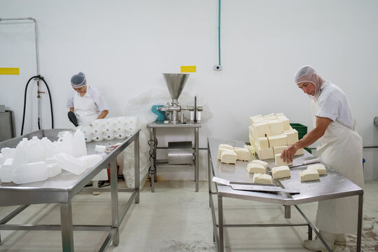 Operators working in a production plant