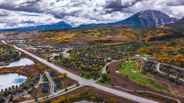 Autumn landscape during fall season with mountains, aerial hyperlapse, Silverthorne, Colorado, 4K