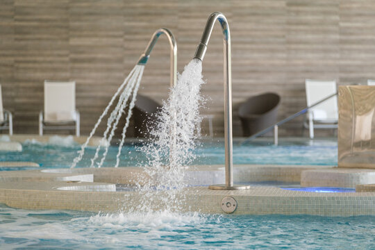 Relaxing spa oasis with water jets in luxury hotel setting